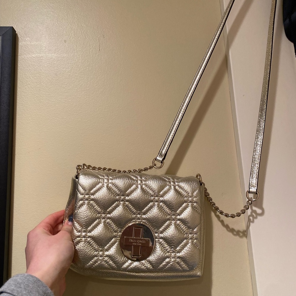 Gold Kate Spade crossbody/handbag. Used minimally and in very good condition
